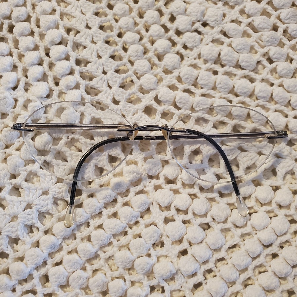 Invincilites by Zyloware Sigma 058 Rimless Eyeglasses Oval 140mm Lightweight Fra